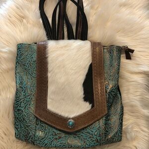 Myra bag leather canvas and hair on hide backpack purse